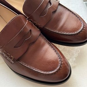 Brown leather loafers by Barney’s New York.